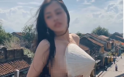 “Hot girl” bán khỏa thân, dùng nón lá che vòng một để quay clip phản cảm trên nóc quán cafe nổi tiếng ở Hội An