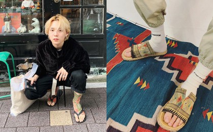 Chẳng đơn giản là mix tất cao cổ với dép lê nữa, E'Dawn đã nâng độ dị biệt của style này lên một tầm cao mới