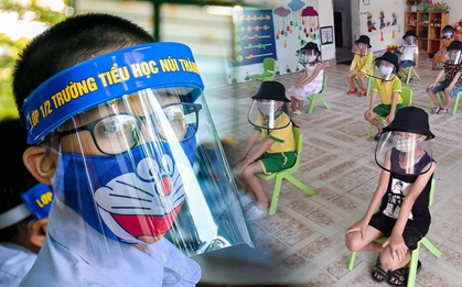 Phụ huynh tranh luận khi học sinh đeo tấm chắn giọt bắn trong lớp học: Người ủng hộ vì hạn chế nguy cơ nhiễm bệnh, người lại thương các con khó chịu, hại mắt