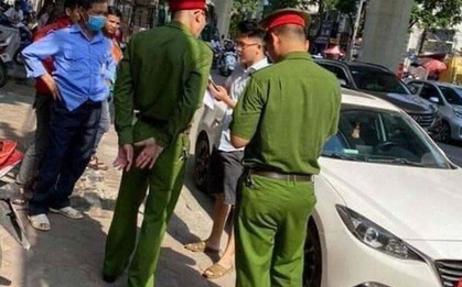 Tài xế điều khiển xe hất cảnh sát lên nắp capo, bỏ chạy 1 km