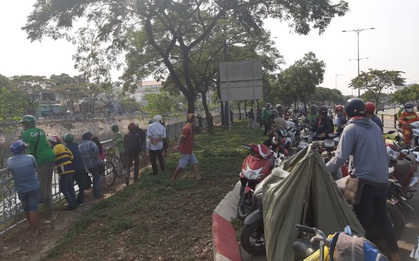 TP.HCM: Người đàn ông leo qua hàng rào, nhảy xuống kênh Tàu Hủ tự tử
