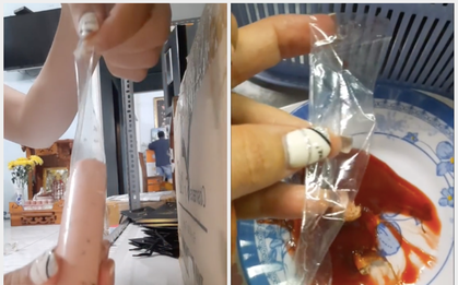 Đăng clip cảnh báo xúc xích có lớp vỏ bọc ni lông "trá hình", cô gái khiến dân tình tranh cãi nảy lửa: Liệu có ăn được không?