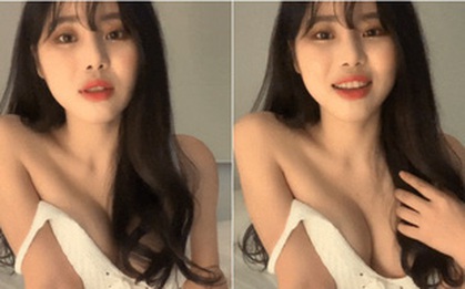 Tụt nội y tới trễ vai rồi dùng tóc che chắn điểm nhạy cảm, nữ streamer xinh đẹp suýt "bay kênh" vì chiêu trò phản cảm