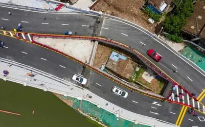 Ngôi nhà 40m2 không chịu di dời khiến cầu cao tốc phải "tách đôi" ở Trung Quốc: Được đền bù thỏa đáng nhưng không chấp nhận, kết cục phải sống giữa khói bụi và tiếng ồn