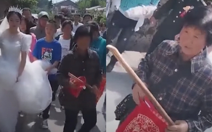 Sợ hôn lễ của cháu bị quậy phá ác ý, bà nội cầm "vũ khí" làm vệ sĩ dẫn đầu đoàn rước dâu với câu tuyên bố đầy thách thức
