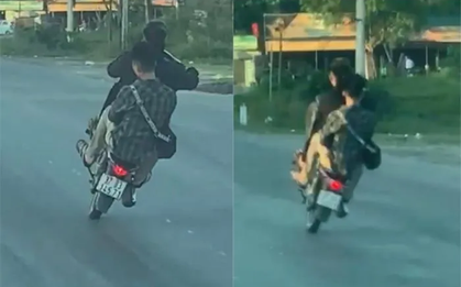 Clip hai thanh niên đi xe máy bốc đầu, đánh võng trên Quốc lộ 1A