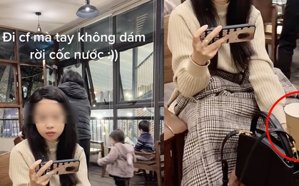 Cô gái đi cà phê phải “ôm” chặt cốc nước vì sợ bị trẻ em trong quán làm đổ, dân mạng dở khóc dở cười nhưng ai cũng đồng cảm