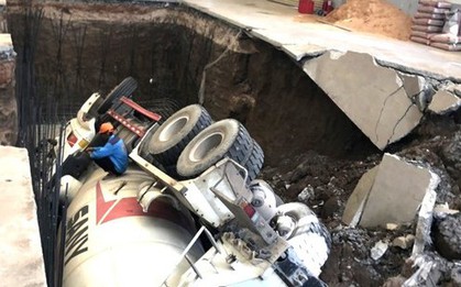 Hi hữu chiếc xe bồn lật nhào xuống hố trong nhà xưởng ở Bình Dương