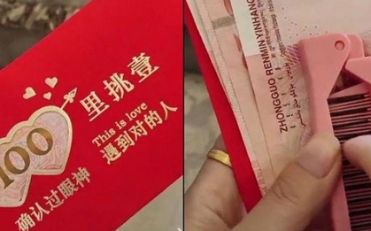 Đi ăn cưới bạn trai cũ, cô gái bất ngờ được chú rể tặng lì xì đỏ, vật bên trong khiến cô khóc nức nở