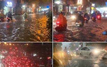 Mưa trắng trời, đường thành 'sông', người Hà Nội chật vật 'vượt' ùn tắc về nhà