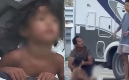 Trẻ trần truồng bò dưới đất, cha mẹ quần áo chỉn chu đứng nhìn: Đây là kiểu “nuôi con tự nhiên” gì vậy?