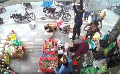 Thợ sơn rơi từ tầng cao xuống trúng người dân