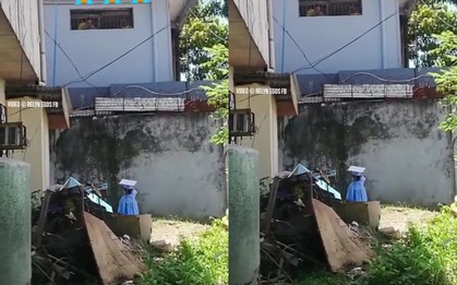 Bé gái 5 tuổi mặc áo tốt nghiệp đứng trước song sắt nhà tù vẫy tay và câu chuyện ám ảnh phía sau