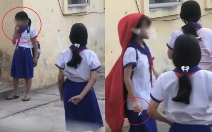 Xôn xao clip 5 nữ sinh tiểu học hút thuốc phì phèo trong sân trường, mời bạn nam hút cùng