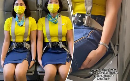 Vì sao các tiếp viên hàng không có tư thế “kỳ quặc” ngồi lên tay mình khi cất cánh và hạ cánh?