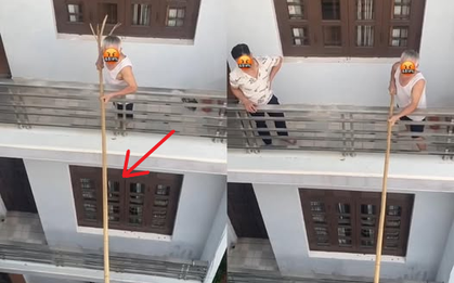 Người đàn ông dùng gậy dài ngăn hàng xóm mở cửa, khi biết nguyên nhân netizen lập tức "quay xe"