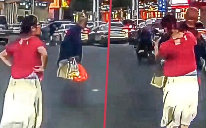 Giúp ông cụ đi qua đường đông đúc, cô gái không được cảm ơn mà bị tát thẳng vào mặt