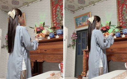 Tranh cãi gay gắt quanh bức ảnh cô gái mặc áo tràng, quần ngắn thắp hương