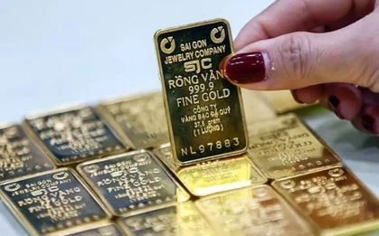 Vàng giảm giá, bạc bật tăng