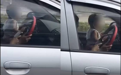 Xác minh clip để trẻ nhỏ ngồi trước vô lăng khi lái xe tại Hà Nội, người mẹ phân trần lý do