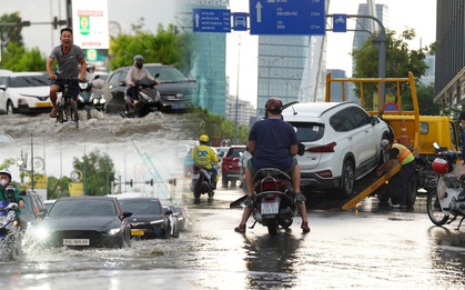 Mưa lớn ngập chân cầu Ba Son, loạt xe chết máy, ô tô phải gọi cứu hộ