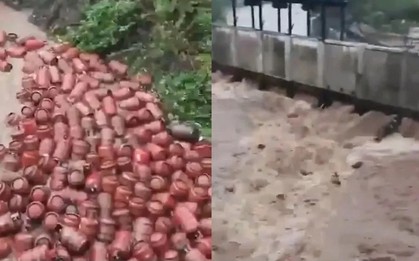 3000 bình gas bị nước lũ cuốn trôi xuống sông, người dân lao ra vớt