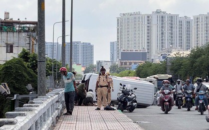 Lật xe trên cầu An Lạc, nam tài xế ở TP.HCM bất ngờ nhảy xuống kênh rồi đòi đánh người cứu