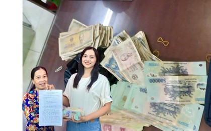 Phát hiện bọc màu đen chứa loạt tờ tiền có mệnh giá từ 1.000 - 500.000 đồng, nữ giáo viên Nguyễn Kiều Oanh lập tức trình báo công an