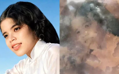 Ảnh cô gái, thẻ khắc dòng chữ ‘quyết không làm nô lệ’ trong phần mộ liệt sĩ
