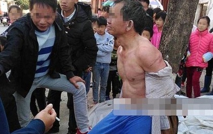 Trừng phạt trộm theo kiểu Trung Quốc: Lột áo, trói vào gốc cây để bêu riếu