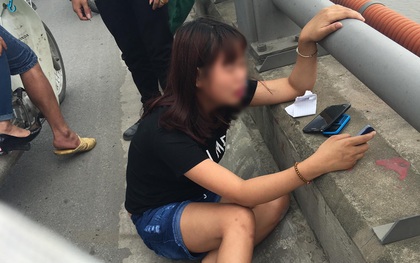 Hà Nội: Cô gái trẻ khóc ngất khi bạn trai đột nhiên mở cửa taxi, nhảy cầu Thanh Trì tự tử
