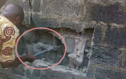 Cậu bé Nigeria được giải cứu sau 3 ngày bị mắc kẹt "khó tin" trong khe tường rộng 30cm