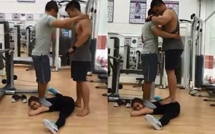 Cô gái nhỏ xíu, nằm xoạc chân để hai chàng trai nặng trăm cân... đứng lên người