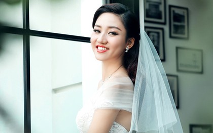 Á hậu Ngô Trà My khoe ảnh cưới lung linh giấu mặt ông xã