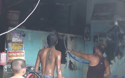 TP.HCM: Mẹ bế con nhỏ 2 tuổi tháo chạy khỏi đám cháy lớn ở tiệm hớt tóc