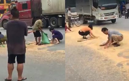 Hưng Yên: Xe chở lúa mỳ bị rơi vãi giữa quốc lộ 5, người dân bất chấp nguy hiểm chạy ra xúc "hộ"