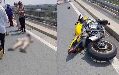 Hà Nội: Nam thanh niên đi xe phân khối lớn đâm đuôi xe ô tô, văng xuống đường bất tỉnh