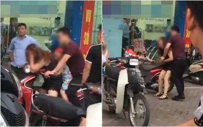 Hà Nội: Mặc con gái gào khóc, người đàn ông vẫn đấm liên tiếp vào mặt vợ đến chảy máu trên phố Xã Đàn