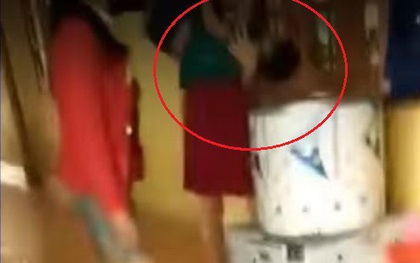 Cô hiệu trưởng dốc đầu bé trai vào máy vặt lông gà bị tạm đình chỉ công tác