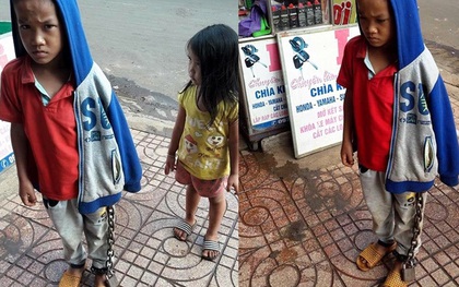 Hình ảnh bé trai bị xích chân giữa chợ khiến nhiều người bức xúc