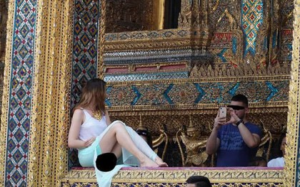 Nữ du khách ăn mặc "thiếu vải", chụp ảnh phản cảm trong chùa, cư dân mạng phẫn nộ yêu cầu bắt giữ