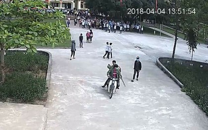 Triệu tập 4 thanh niên mang hung khí, điều khiển xe máy lao vào trường hành hung học sinh