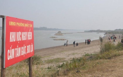 Hà Nội: Công an tìm kiếm thân nhân của người phụ nữ mang bầu tử vong bất thường dưới bãi đá sông Hồng