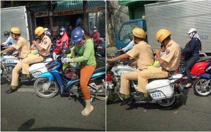 Hình ảnh đẹp: 2 đồng chí CSGT giúp đỡ người phụ nữ, vừa cho bú bình vừa chở cháu bé len lỏi qua đoạn đường ùn tắc đến bệnh viện kịp thời