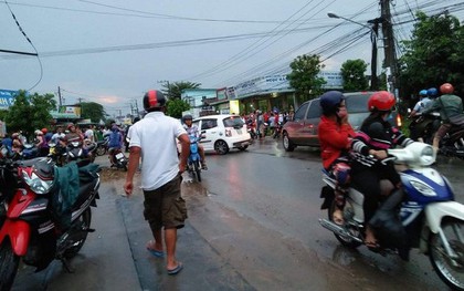 Hai thanh niên bị nước cuốn xuống cống, một người chết thảm ở Bình Dương