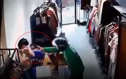 Nữ nhân viên shop quần áo ở Hà Nội kể lại giây phút bị gã đàn ông mặc áo GrabBike xịt dung dịch lạ để cướp tài sản
