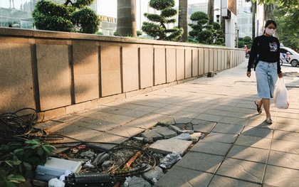 Hà Nội: Vỉa hè lát đá "có độ bền 70 năm" bị bong tróc, nứt tóac chỉ sau... 2 năm sử dụng
