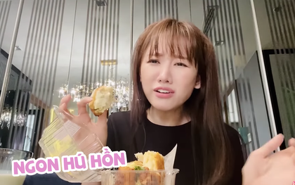 Mua món bánh mì đang cực hot về review nhưng vì quá thèm nên Hari Won đã ăn luôn trên đường đi