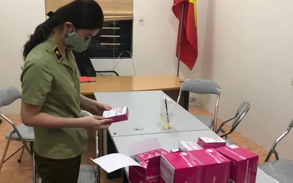 Kiểm tra ô tô đỗ ở chung cư, QLTT phát hiện 800 bộ test nhanh Covid-19 không rõ nguồn gốc