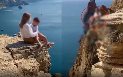 Mẹ đưa con trai lên vách đá chụp ảnh sống ảo, dân mạng phát hiện chi tiết "chết người", đòi "tước quyền làm mẹ ngay"